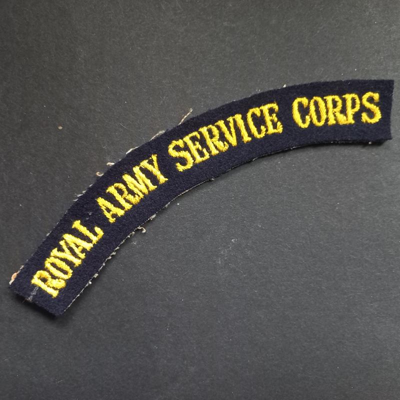 A great and un-issued (albeit regrettably single) so called 'serif' type lettering Royal Army Service Corps shoulder title attributed to members of the 250 (Airborne) Light Composite Company, Royal Army Service Corps