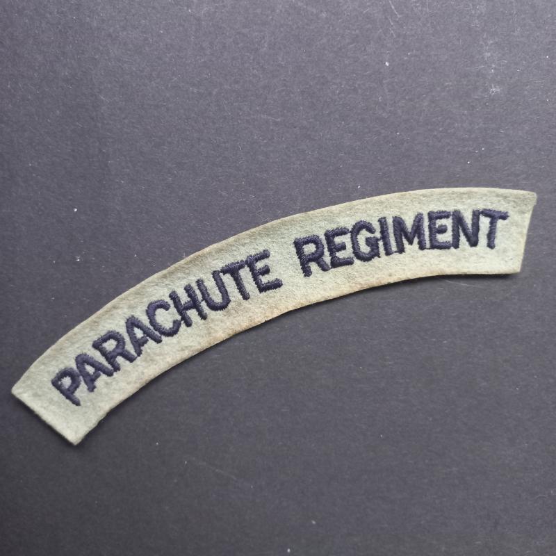 A nice - regrettably single - un-issuesd so called paste back i.e glue back embroided Parachute Regiment shoulder title