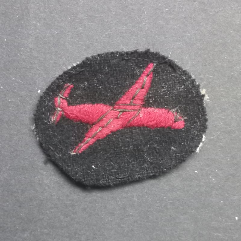 A superb and attractive (difficult to find) Indian - red on black - made Glider qualification badge
