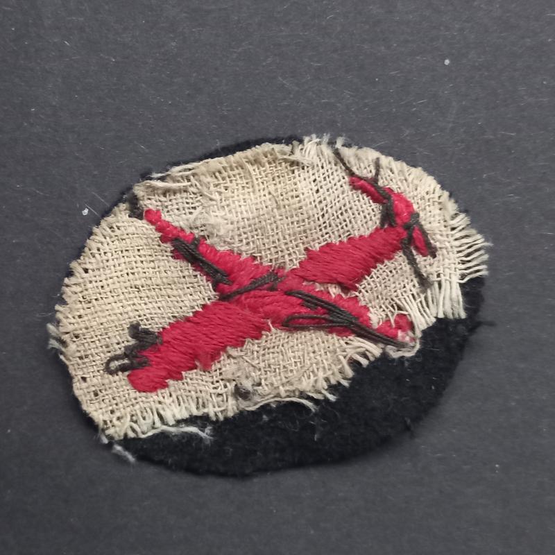 A superb and attractive (difficult to find) Indian - red on black - made Glider qualification badge