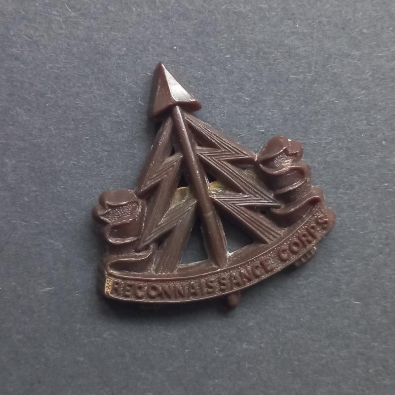 A superb plastic i.e bakelite made all ranks Reconnassiance Corps cap badge