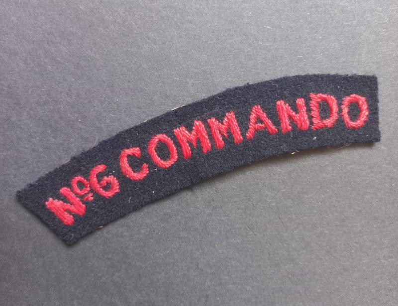 A attractive (mid war period) un-issued No.6 Commando shoulder title