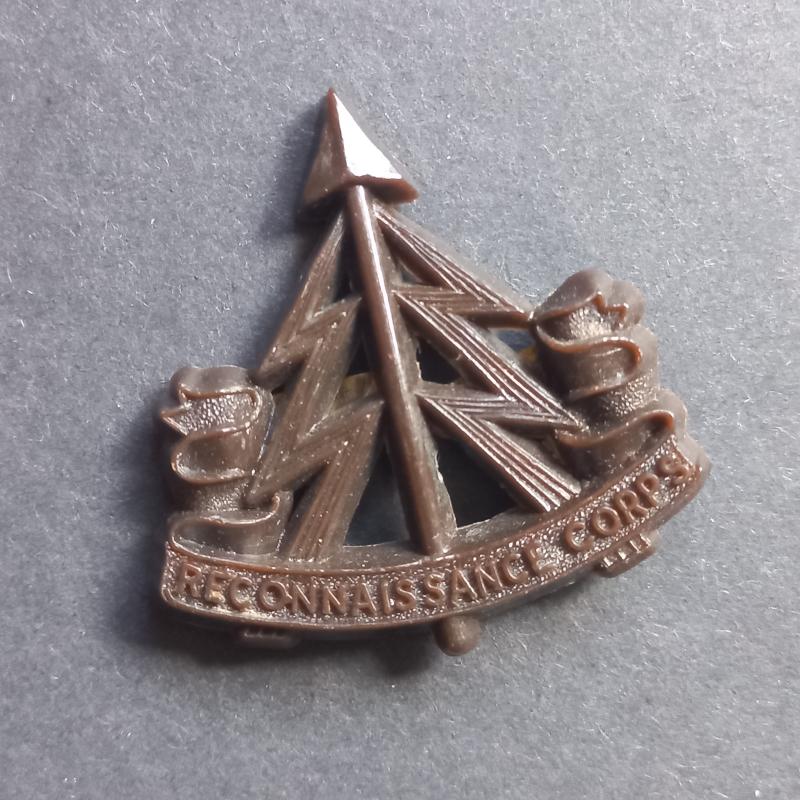A superb plastic i.e bakelite made all ranks Reconnassiance Corps cap badge