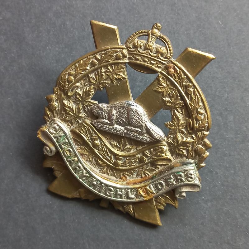 A attractive - Canadian made - Calgary Highlanders cap badge