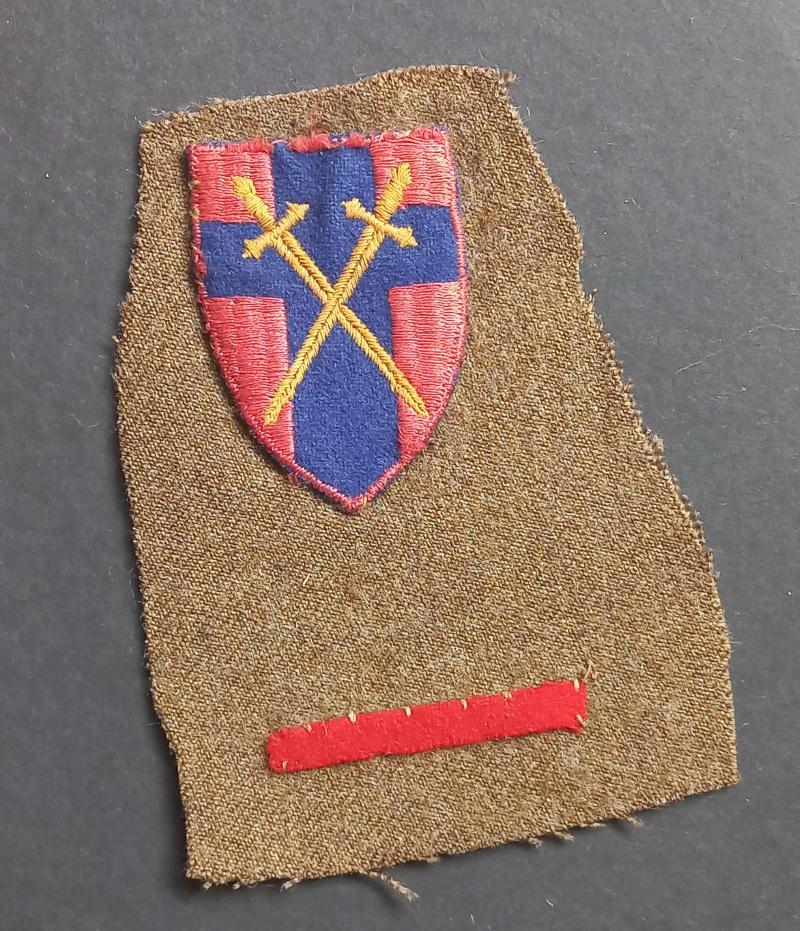 A attractive set of badges - still on a piece of battle dress - to the British 21st Army Group