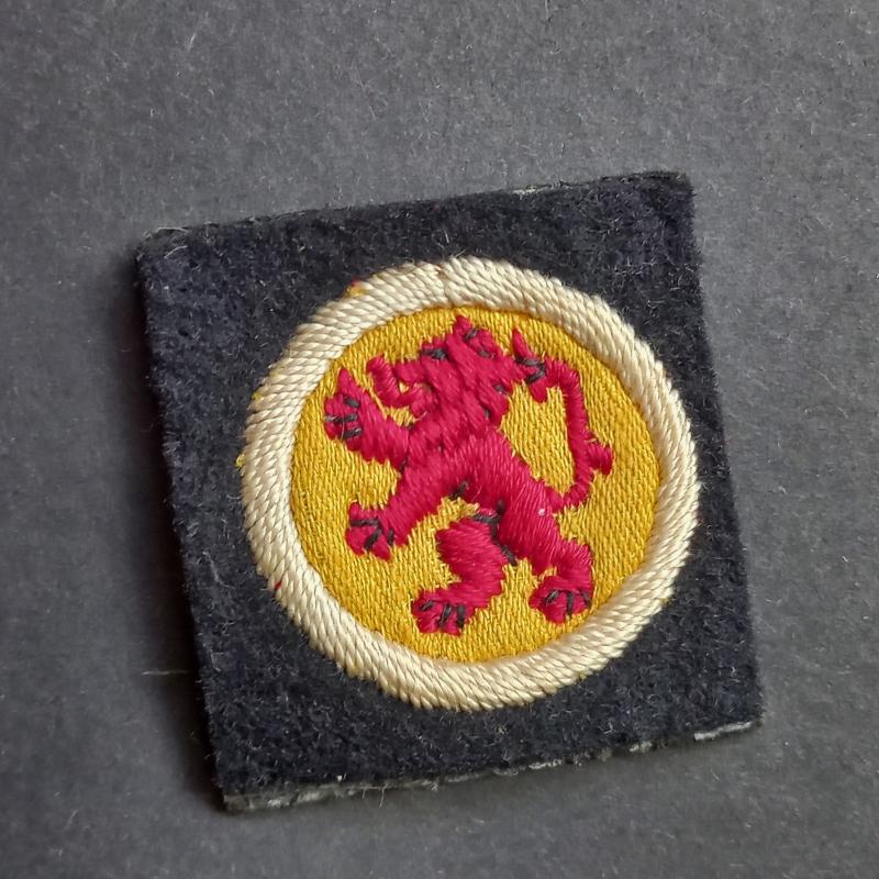 A superb and neatly used (removed from uniform) 15th (Scottish) Infantry Division formation badge