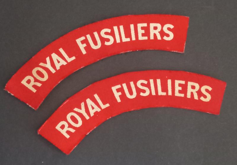 A superb - full matching - set of printed (made by Calico Printers) Royal Fusiliers shoulder titles