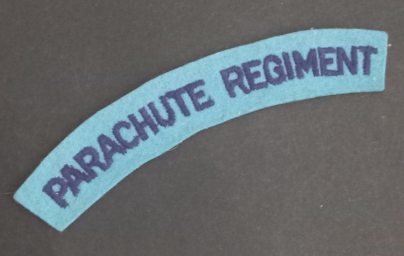 A nice - regrettably single - un-issuesd so called paste back i.e glue back embroided Parachute Regiment shoulder title