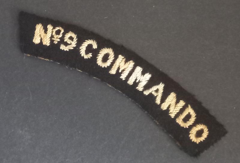 A superb - albeit regrettably single - typical British made Number 9 Commando shoulder title