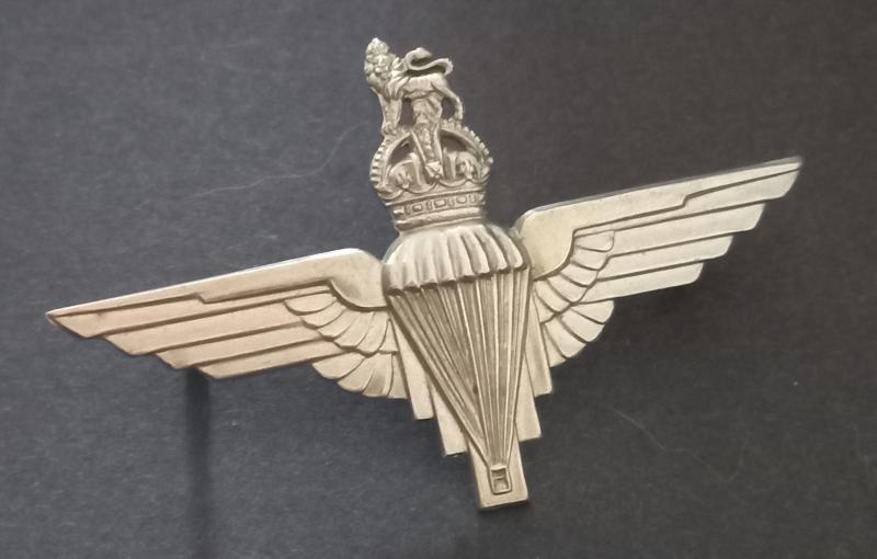 A nice uncommon - so called cut-out i.e voided crown - cap badge to the Parachute Regiment