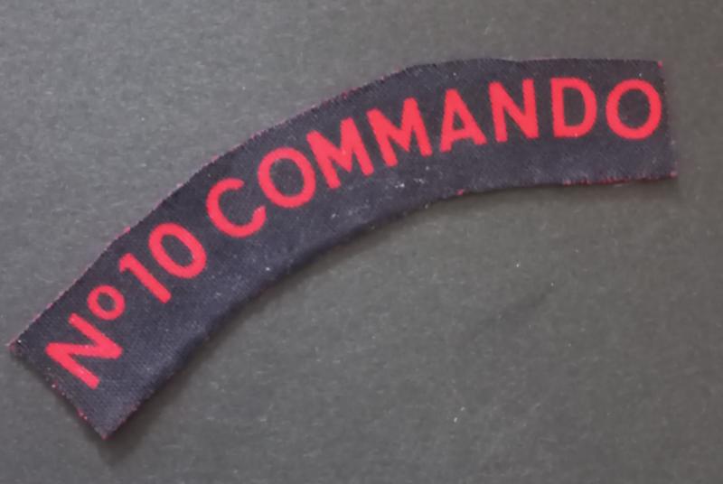 A attractive and sought after - regrettably 'cut down' - No.10 Commando printed shoulder title