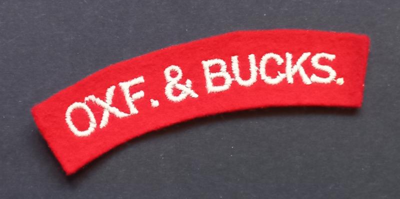 A attractive - albeit regrettably single - un-issued embroided Oxf.& Bucks. (Oxfordshire and Buckinghamshire Light Infantry) shoulder title