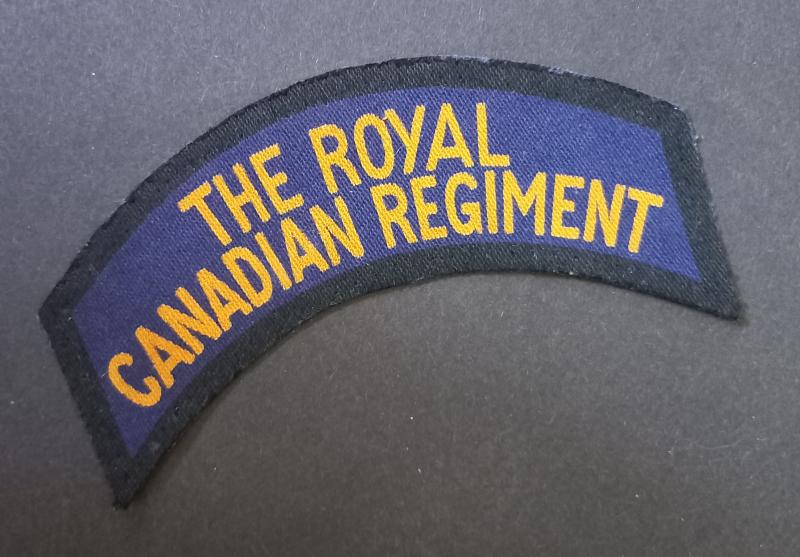 A attractive  (British made) The Royal Canadian Regiment printed i.e canvas shoulder title