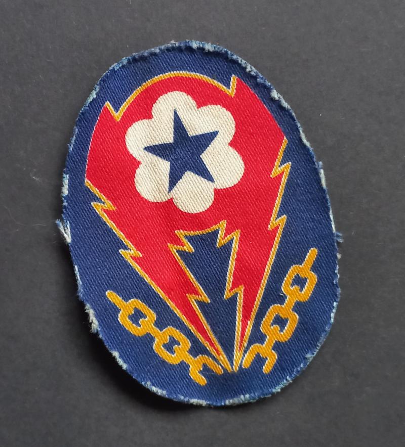 A superb (printed British made) United States Army ETO (European Theatre of Operations) advance Base shoulder patch