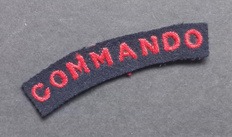 A superb - albeit regrettably single - early embroided Commando shoulder title