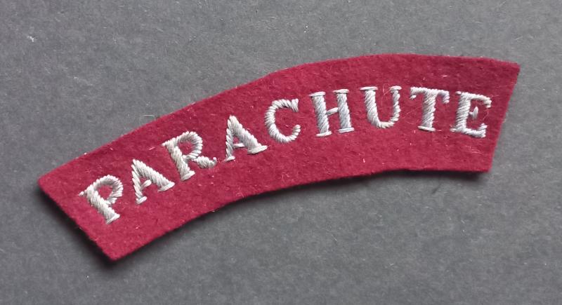 A superb - regrettably single - mid war period 'serif' type lettering Parachute shoulder title