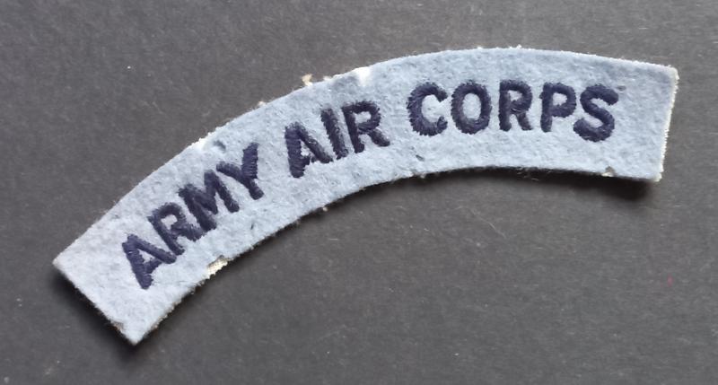 A neat - unfortnatly post war issue - Army Air Corps embroided shoulder title
