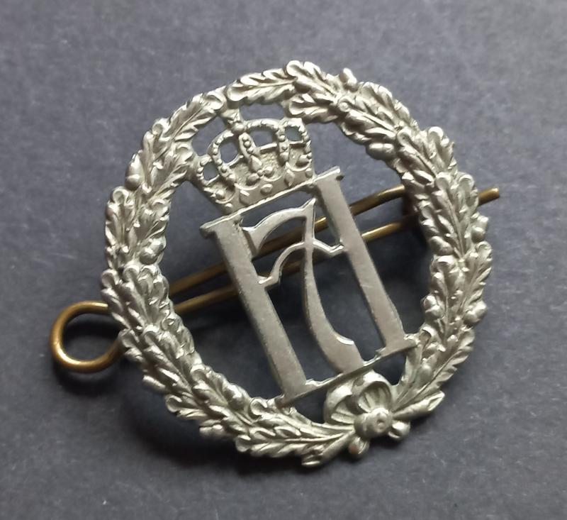 A superb and difficult to find (British made) Norwegian Free Forces Haakon 7 NCO's capbadge