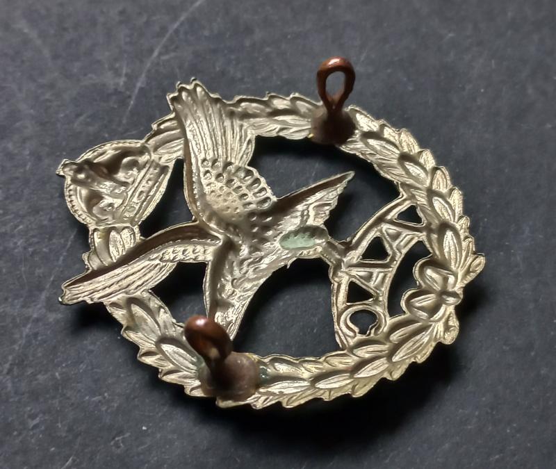 A superb - highly detailed - white metal Army Air Corps cap badge
