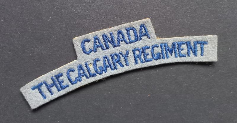 A attractive - British made - Canadian The Calgary Regiment shoulder title