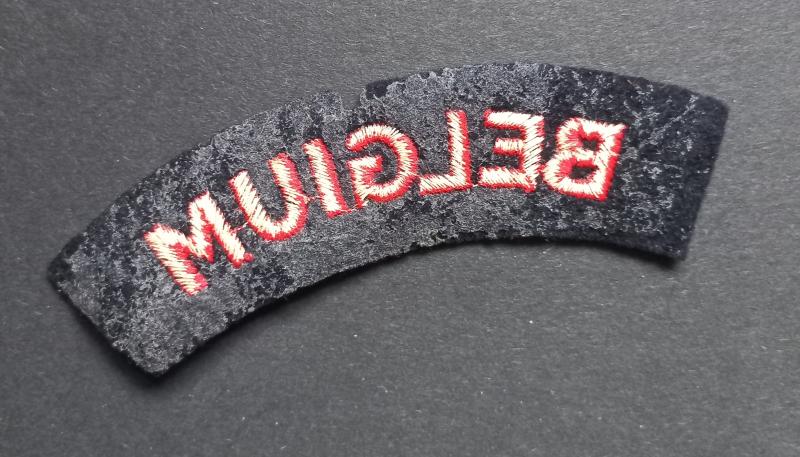 A superb - albeit regrettably single - British made Belgium shoulder title