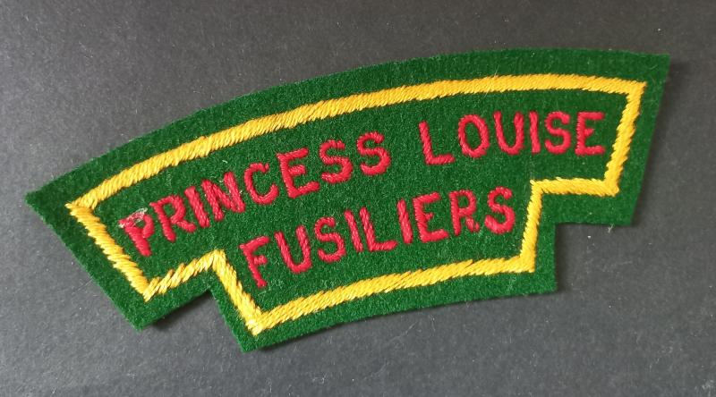 A superb and un-issued (typical British made) Canadian Princess Louise Fusiliers embroided shoulder title