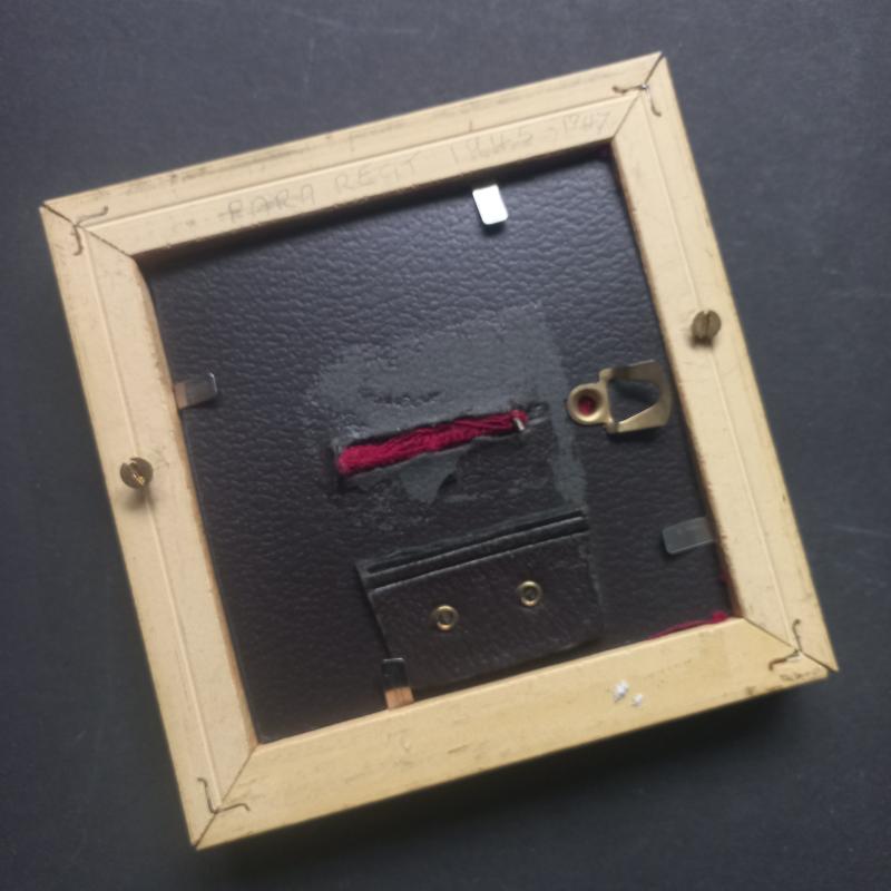 A nicely framed - nickel plated - Parachute Regiment beret badge (unfortunately missing its two brass lugs)