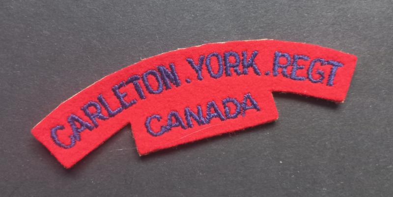 A superb un-issued British made Canadian Carleton York Regiment embroided (with white backing) shoulder title