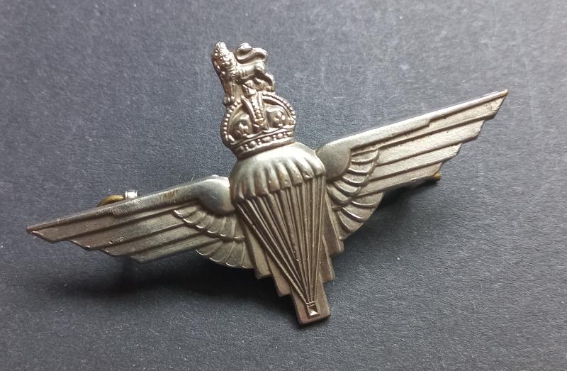 A attractive - standard wartime issued - capbadge to the Parachute Regiment