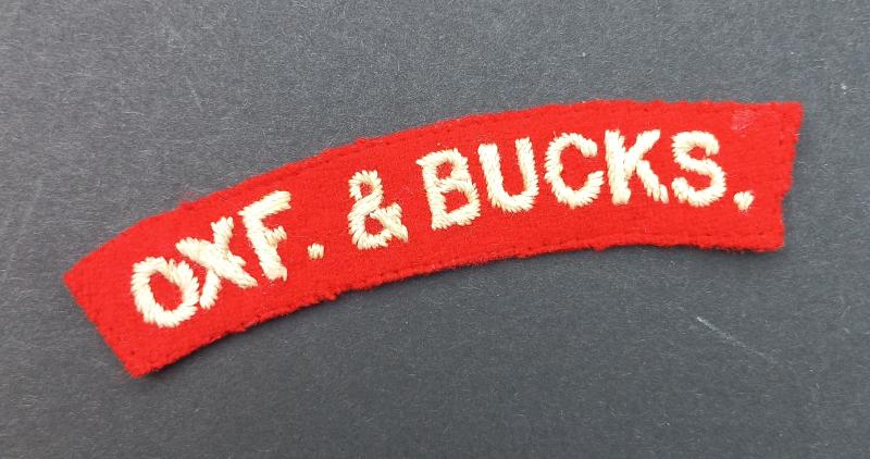 A attractive - albeit regrettably single - issued embroided Oxf.& Bucks. (Oxfordshire and Buckinghamshire Light Infantry) shoulder title