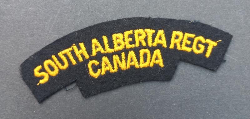 A superb (British made glue/paste backing) Canadian South Alberta Regiment emboided shoulder title