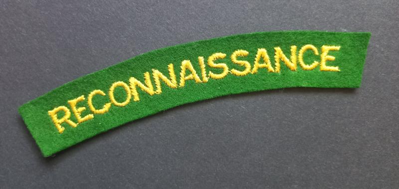 A fine - mid-war period paste backing - un-issued embroided Reconnaissance Corps shoulder title