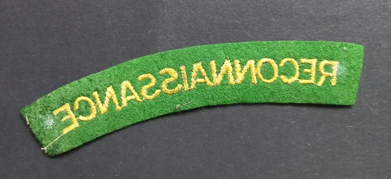 A fine - mid-war period paste backing - un-issued embroided Reconnaissance Corps shoulder title