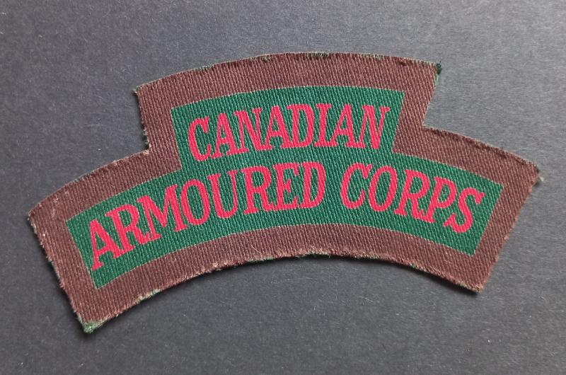A perfect and un-issued British made Canadian Armoured Corps shoulder title