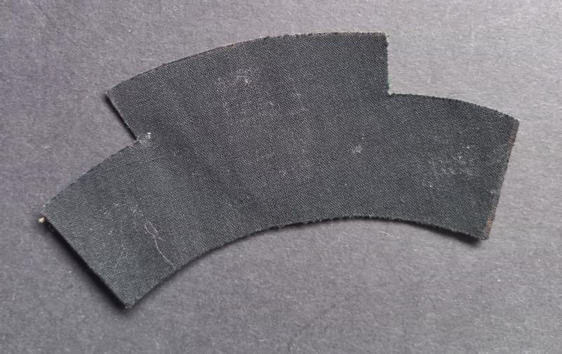 A perfect and un-issued British made Canadian Armoured Corps shoulder title