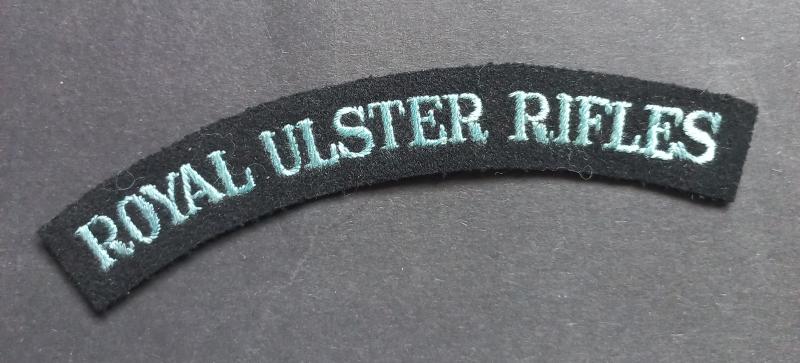 A superb and rarely seen - albeit regrettably single - early Royal Ulster Rifles embroided shoulder title