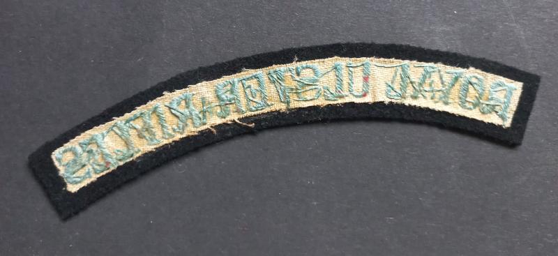 A superb and rarely seen - albeit regrettably single - early Royal Ulster Rifles embroided shoulder title