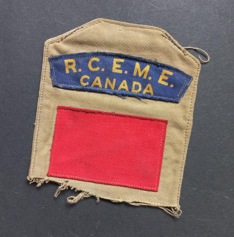 A good R.C.E.M.E. - Royal Canadian Electrical & Mechanical Engineers - 1st Canadian Infantry Division (unfortnately cutt down) tropical arm brassard