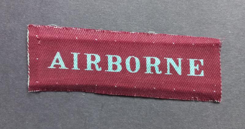 A superb (un-issued) example of a - unfortunately single - Airborne arms-of-service strip