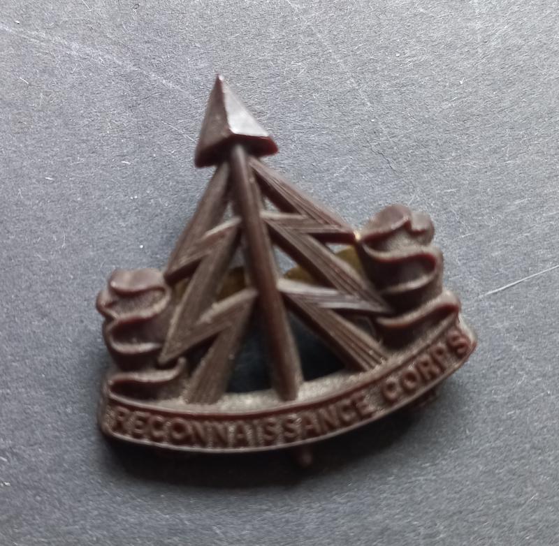 A superb plastic i.e bakelite made all ranks Reconnassiance Corps cap badge